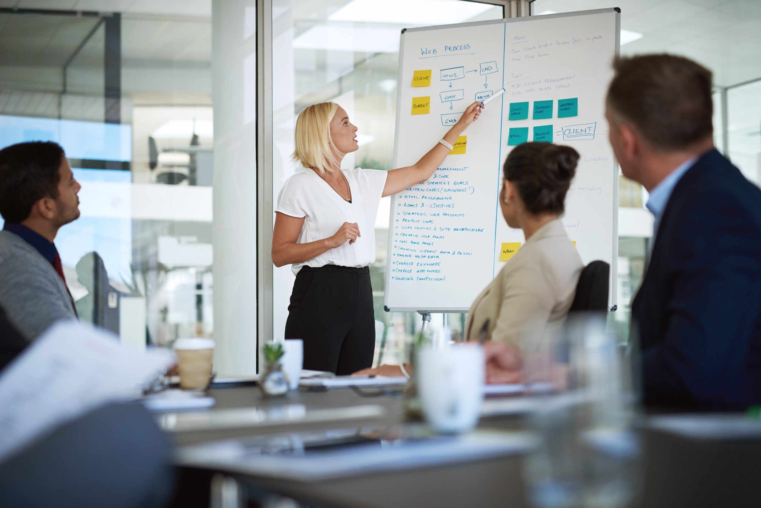 woman conducting management training