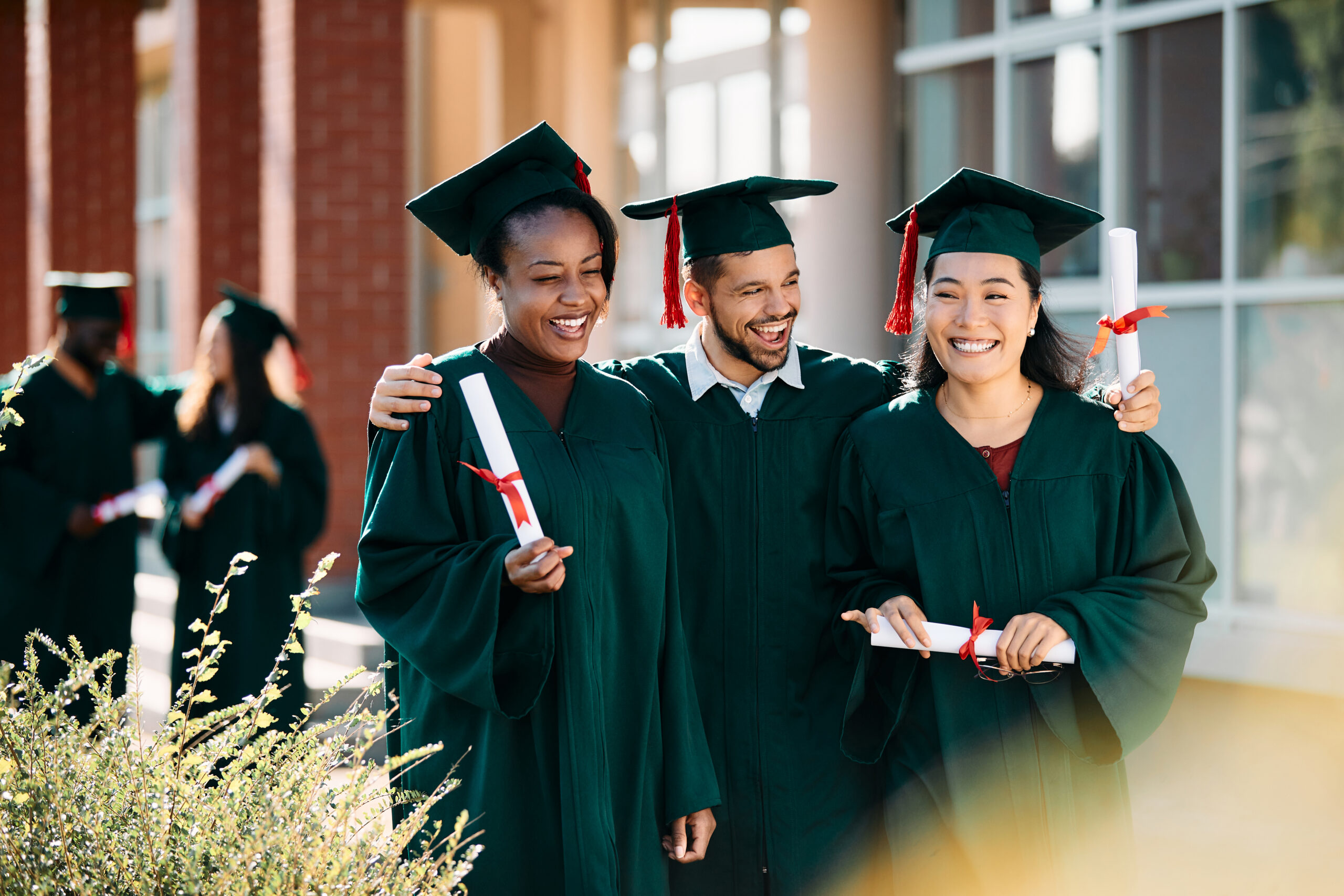 Group of proud new graduates, capturing the excitement of graduation day.