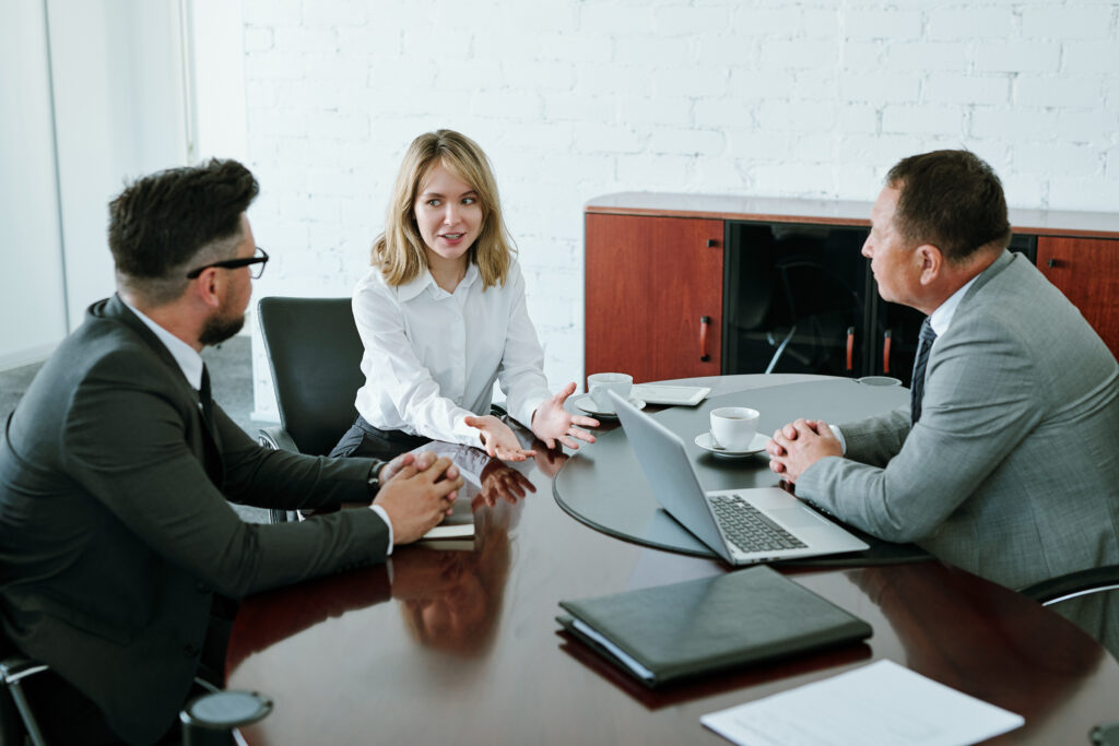 A direct marketing professional talking to clients