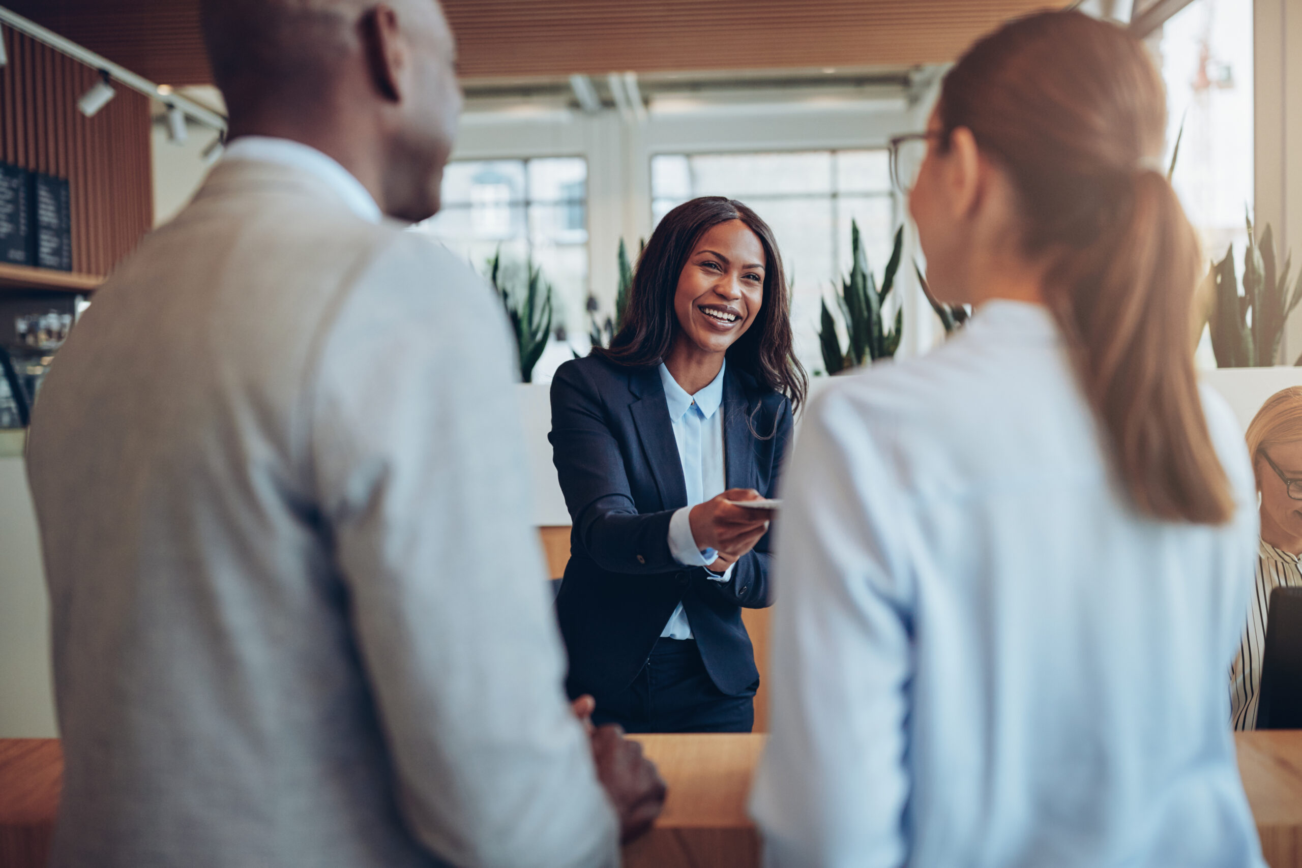 A warm face-to-face interaction helps illustrate what Synaptic, Inc. does to build meaningful connections.